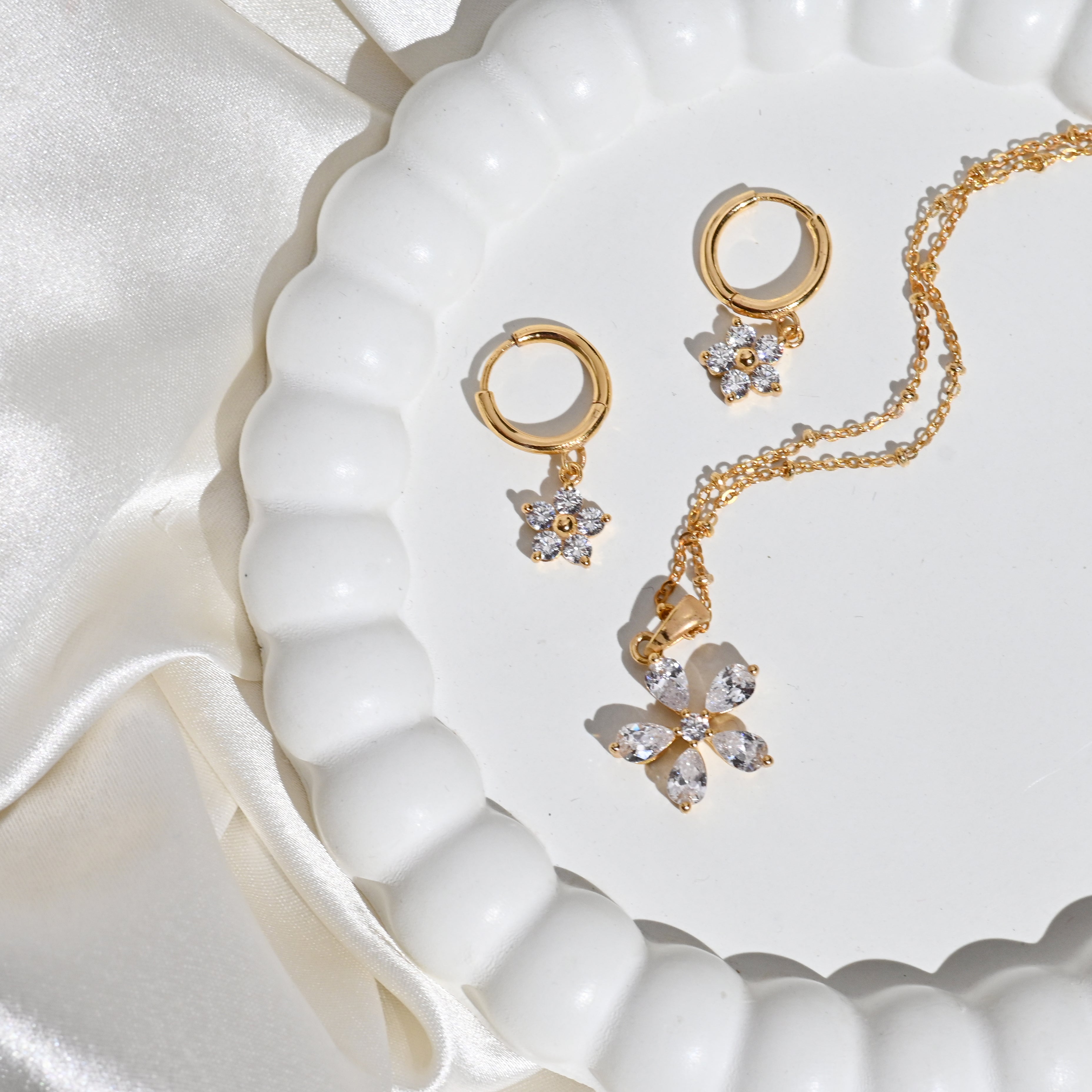 Celebrate in Style: Match Mizoya's Solitaire Collection to Your Festive Look.